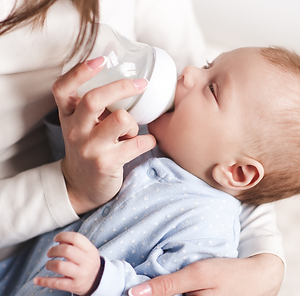 Baby being fed